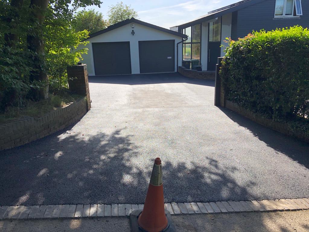 This is a photo of a bitumen driveway which is in the process of being installed by Wattle Glen Road Tech